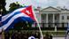 A person waves a Cuban flag in front of the White House during a July 26 demonstration in support of protesters in Cuba A person waves a Cuban flag in front of the White House during a July 26 demonstration in support of protesters in Cuba