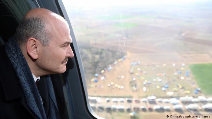 Turkish Interior Minister Suleyman Soylu looking out of a plane window at the border to Greece, March 2020