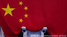 (210729) -- TOKYO, July 29, 2021 (Xinhua) -- The national flag of China is seen during the awarding ceremony of the women's 200m butterfly final at the Tokyo 2020 Olympic Games in Tokyo, Japan, July 29, 2021. (Xinhua/Xu Chang)
