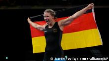 Germany's Aline Rotter Focken celebrates defeating United States Adeline Maria Gray during the women's 76kg freestyle wrestling final match at the 2020 Summer Olympics, Monday, Aug. 2, 2021, in Chiba, Japan. (AP Photo/Aaron Favila)