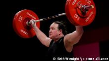 Laurel Hubbard of New Zealand competes in the women's 87kg weightlifting event at the 2020 Summer Olympics, Monday, Aug. 2, 2021, in Tokyo, Japan. (AP Photo/Seth Wenig)