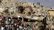 Petugas penyelamat dan warga sedang berusaha mencari korban selamat di balik reruntuhan gedung, Leh, India, Jumat (06/08). Petugas penyelamat dan warga sedang berusaha mencari korban selamat di balik reruntuhan gedung, Leh, India, Jumat (06/08).
