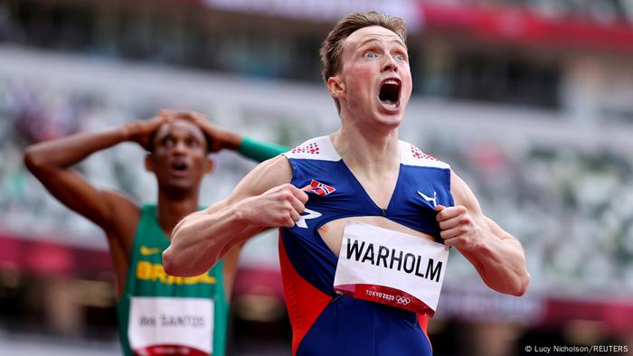 Karsten Warholm celebrates in the 400-meter hurdles.
