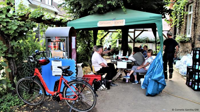 Germany, people sitting in a tent in the Eifel Germany, people sitting in a tent in the Eifel