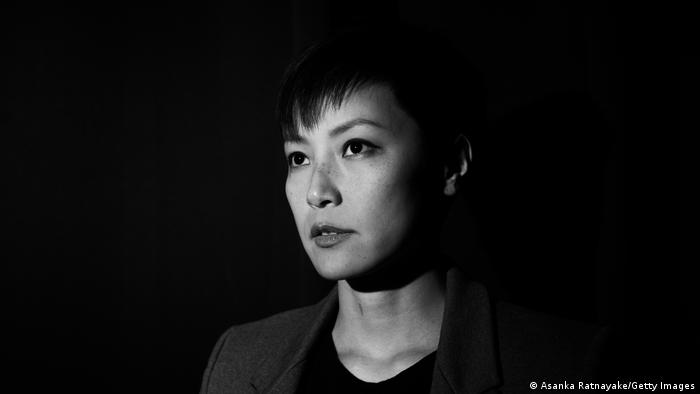 Black and white profile picture of a woman with short hair