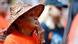 A woman listens to speeches at a gathering following a march after the discovery of hundreds of graves of indigenous children at residential schools across the country in Chemainus, British Columbia, Canada A woman listens to speeches at a gathering following a march after the discovery of hundreds of graves of indigenous children at residential schools across the country in Chemainus, British Columbia, Canada