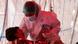 A nurse treats a COVID patient A nurse treats a COVID patient