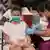 Foto mostra menina sendo vacinada. Ela usa máscara e está de vestido. Um profissional da saúde aplica a vacina. Ele veste roupa roxa e luvas azuis. Os dois estão sentados. 