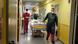 A COVID-19 patient is wheeled through a German hospital A COVID-19 patient is wheeled through a German hospital