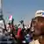 Anhänger von Präsident Kagame bei Kundgebung (Foto: EPA/Charles Shoemaker)
