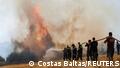 06.08.2021++++ Firefighters and volunteers try to extinguish a wildfire burning near Agios Stefanos, north of Athens, Greece August 6, 2021. REUTERS/Costas Baltas