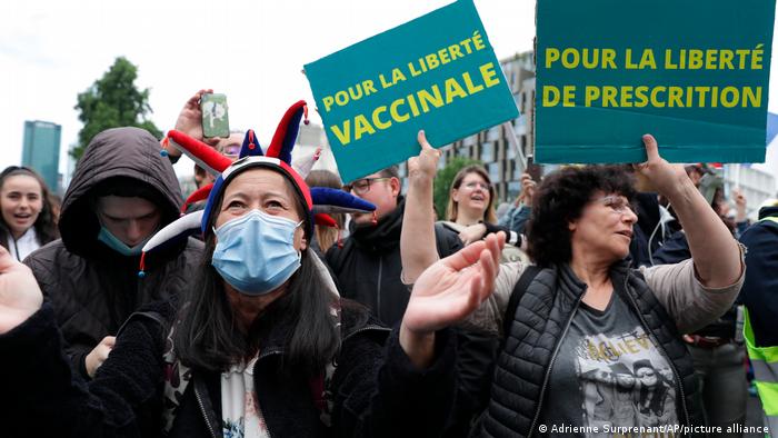 Anti-vax protesters against the vaccine and vaccine passports, during a demonstration in Paris, France