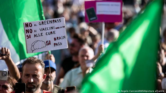 Demonstrators during a protest against the Green Pass vaccine passport in the center of Rome, Italy