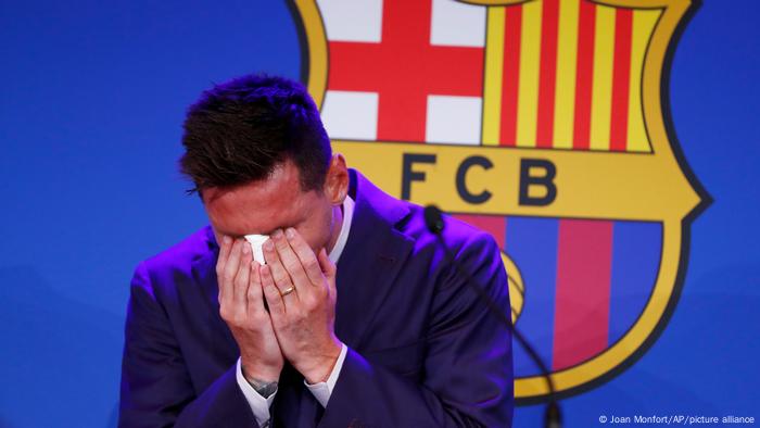 Lionel Messi cries at the start of a press conference at the Camp Nou stadium in Barcelona, Spain, Sunday, Aug. 8, 2021.