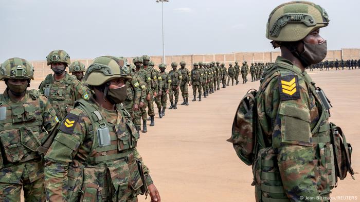 Rwandan soldiers waiting to board a plane