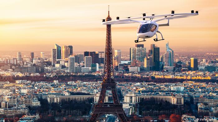 Рекламное изображение аэротакси компании Volocopter над Парижем