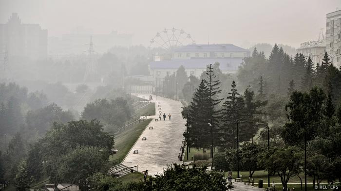 A general view shows the Siberian city of Krasnoyarsk covered with smoke from forest fires, Russia, August 7, 2021