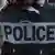 A French police officer's vest that reads 'police'