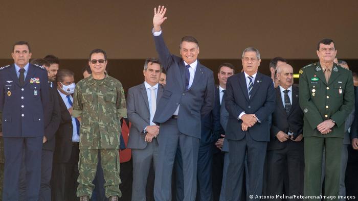 President Jair Bolsonaro waved to onlookers as the military parade took place
