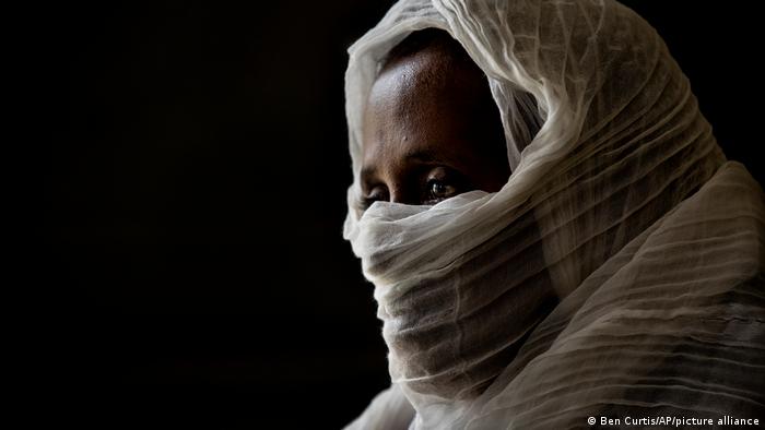 Side view photo of a 40-year-old woman who says she was held captive and repeatedly raped by 15 Eritrean soldiers over a period of a week in a remote village near the Eritrean border with Ethiopia.