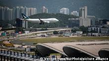 A Plane Belonging to the Hong Kong based airline Cathay Pacific landing in Hong Kong International Airport in Hong Kong on August 13, 2019. (Photo by Vernon Yuen/NurPhoto)