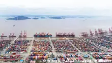 (210304) -- BEIJING, March 4, 2021 (Xinhua) -- Aerial photo taken on March 3, 2021 shows a view at the Ningbo Zhoushan Port in Ningbo, east China's Zhejiang Province. Both cargo and container throughput of Ningbo Zhoushan Port registered year-on-year growth of 4.7 percent and 4.3 percent respectively in 2020. The port saw its cargo throughput reach 1.172 billion tons while the container throughput achieved 28.72 million twenty-foot equivalent units (TEUs) last year. (Xinhua/Weng Xinyang)