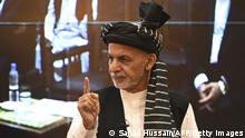 Afghanistan's President Ashraf Ghani gestures during a function at the Afghan presidential palace in Kabul on August 4, 2021. (Photo by SAJJAD HUSSAIN / AFP) (Photo by SAJJAD HUSSAIN/AFP via Getty Images)