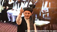 Afghanistan's President Ashraf Ghani gestures during a function at the Afghan presidential palace in Kabul on August 4, 2021. (Photo by SAJJAD HUSSAIN / AFP) (Photo by SAJJAD HUSSAIN/AFP via Getty Images)