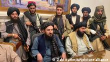 Taliban fighters take control of Afghan presidential palace after the Afghan President Ashraf Ghani fled the country, in Kabul, Afghanistan, Sunday, Aug. 15, 2021. (AP Photo/Zabi Karimi)