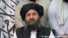 Mullah Baradar Akhund, a senior official of the Taliban, makes a video statement, in a still image taken from a video recorded in an unidentified location and released on August 16, 2021. Social Media/via REUTERS THIS IMAGE HAS BEEN SUPPLIED BY A THIRD PARTY.