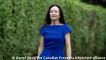 Meng Wanzhou, chief financial officer of Huawei, leaves home to attend her extradition hearing at B.C. Supreme Court, in Vancouver, on Monday, August 16, 2021. (Darryl Dyck/The Canadian Press via AP)