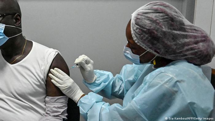 A man is vaccinated against Ebola