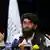 Taliban spokesman Zabihullah Mujahid speaks at at his first news conference, in Kabul