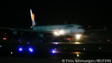 A Lufthansa plane carrying people who have being evacuated from Kabul, Afghanistan lands on an airport runway in Frankfurt, Germany August 18, 2021. REUTERS/Thilo Schmuelgen