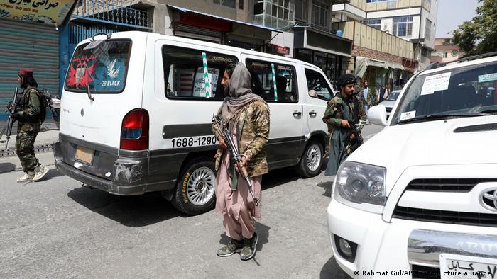 Taliban fighters patrol Kabul on August 18, 2021