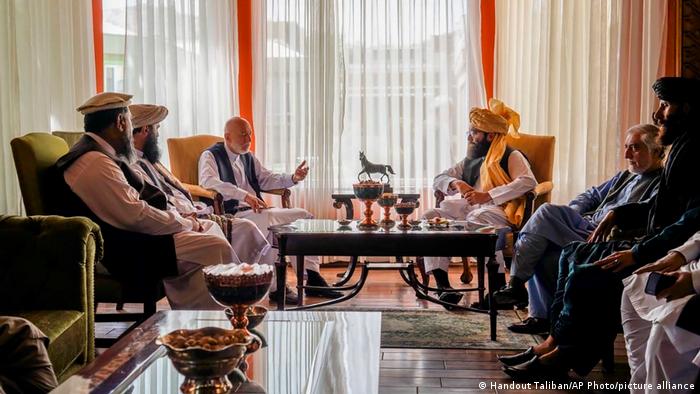 Hamid Karzai, Abdullah Abdullah and Taliban officials