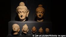 Various heads of Buddha from statues excavated from Hadda during 2nd-3rd century CE are exhibited in the Kabul Museum in Kabul on October 13, 2012. Buddhism in Afghanistan is traced back to the middle of the 3rd century CE and started fading with the arrival of Islam in the 7th century AD. AFP PHOTO/Jawad Jalali (Photo credit should read Jawad Jalali/AFP/GettyImages)