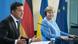 Volodymyr Zelenskyy speaks alongside Angela Merkel in July Volodymyr Zelenskyy speaks alongside Angela Merkel in July