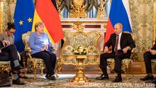Russian President Vladimir Putin receives German Chancellor Angela Merkel at the Kremlin in Moscow, Russia August 20, 2021. Guido Bergmann/BPA/Handout via REUTERS ATTENTION EDITORS - THIS IMAGE HAS BEEN SUPPLIED BY A THIRD PARTY NO RESALES. NO ARCHIVES