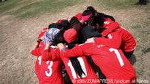 KABUL, April 1, 2011 Afghan women's national soccer team cheer up before a friendly match against NATO-led International Security Aid Force women's soccer team in Kabul, capital of Afghanistan, on April 1, 2011. The match ended with a 0-0 tie. (Xinhua/Ahmad Massoud