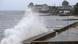 Waves hit a sea wall in Connecticut in advance of Henri Waves hit a sea wall in Connecticut in advance of Henri