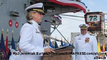 STYLELOCATIONU.S. Navy Capt. Amy Bauernschmidt, incoming commanding officer of the aircraft carrier USS Abraham Lincoln, reads her orders during a change of command ceremony on the flight deck August 19, 2021 in San Diego, California. Bauernschmidt becomes the first woman to command a nuclear-powered aircraft carrier in American history. (Credit Image: Â© Mc3 Jeremiah Bartelt/Planetpix/Planet Pix via ZUMA Press Wire