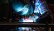 A welder laying a bead A welder laying a bead