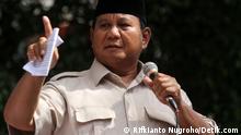 Prabowo Subianto giving a speech.