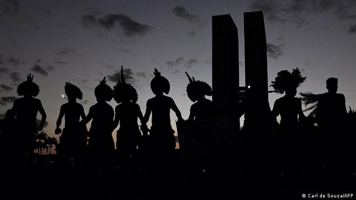 Members of different indigenous tribes protest outside the Supreme Court Building in Brasilia, on August 24, 2021.