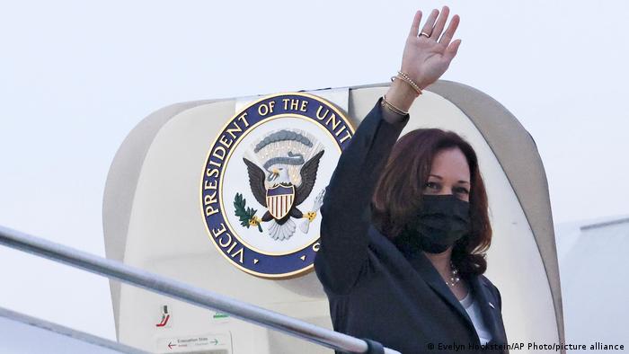 US Vice President Kamala Harris waves as she departs Singapore to Vietnam on Tuesday