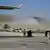 Клубы дыма над аэропортом Кабула после первого взрыва