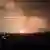 Flames and smokes rise from a Kazakh military base