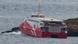The catamaran San Gwann, owned by the German shipping company FRS, stuck on a rock The catamaran San Gwann, owned by the German shipping company FRS, stuck on a rock