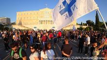 August 29, 2021, Athens, Greece: Riot police clash with anti-vaccine protesters at central Syntagma square. Police used tear gas to disperse thousands of protesters opposing government's plans for mandatory vaccination and new testing requirements and attendance restrictions on people who aren't vaccinated against COVID-19. (Credit Image: Â© Eurokinissi via ZUMA Press Wire